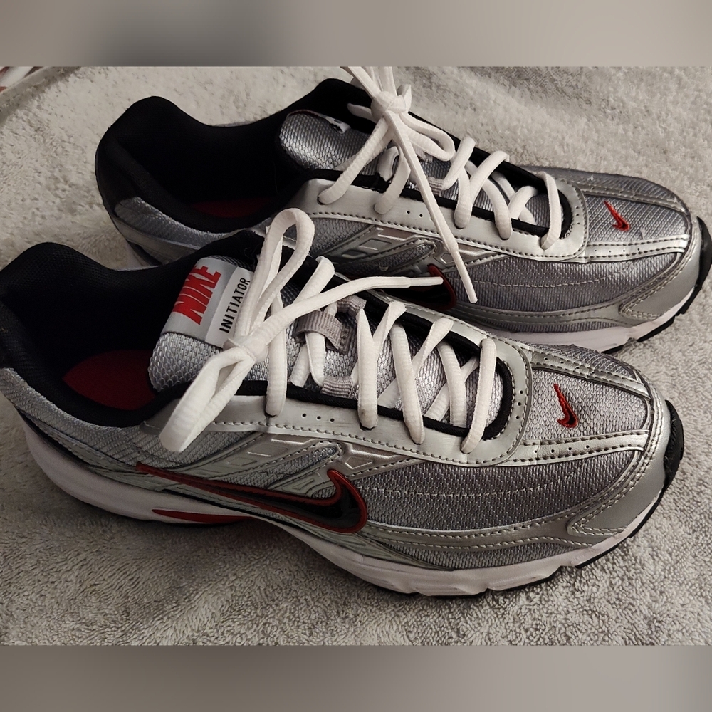 Nike Initiator running sneakers in metallic silver, black and red. Worn Once.